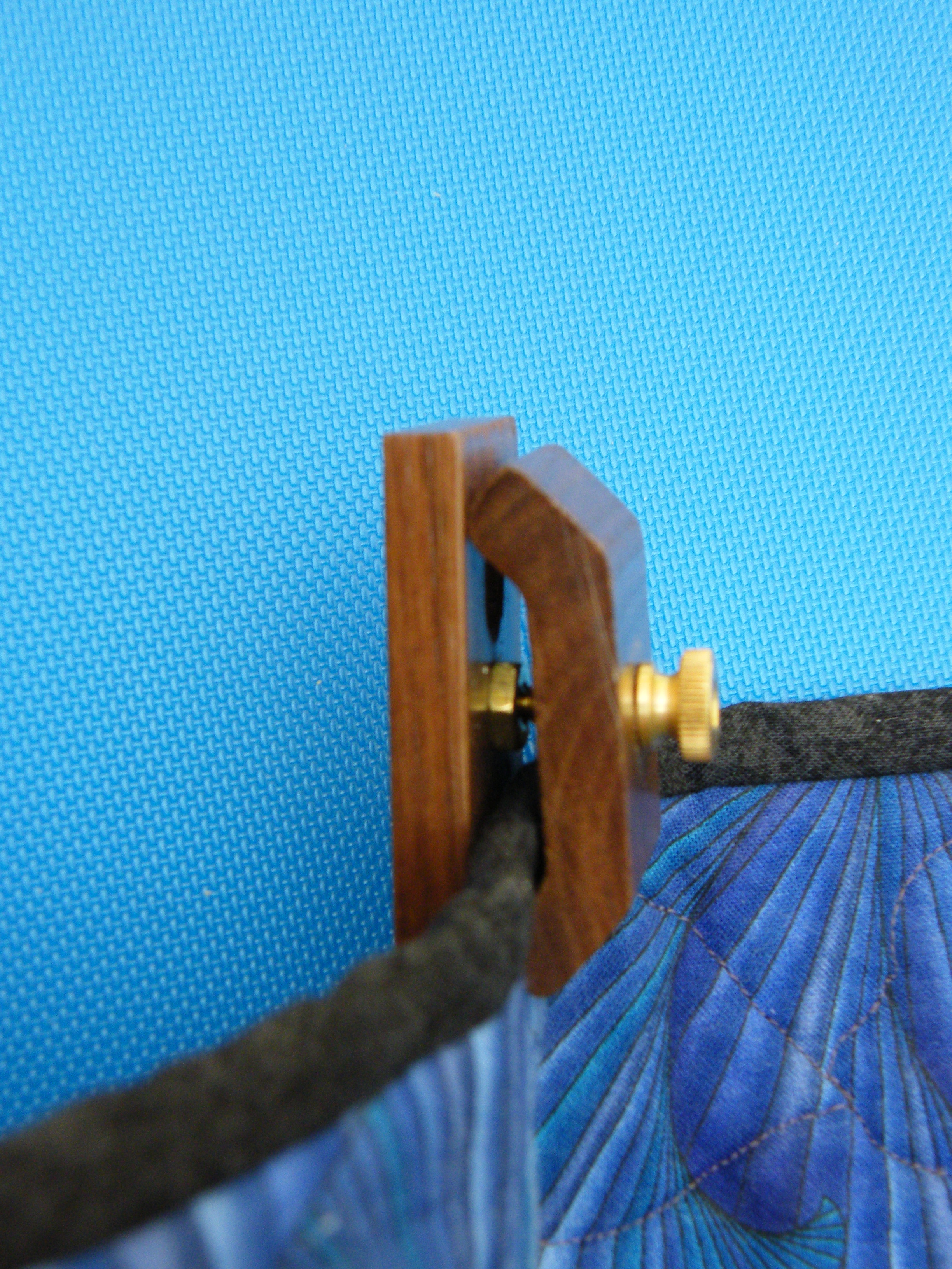 Mini Hang-Ups™ quilt hangers use small 3M™ Command strips